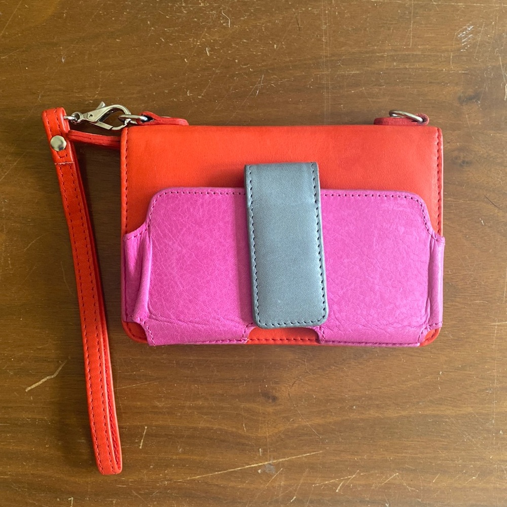 Case Mate wristlet. Bright orange/red